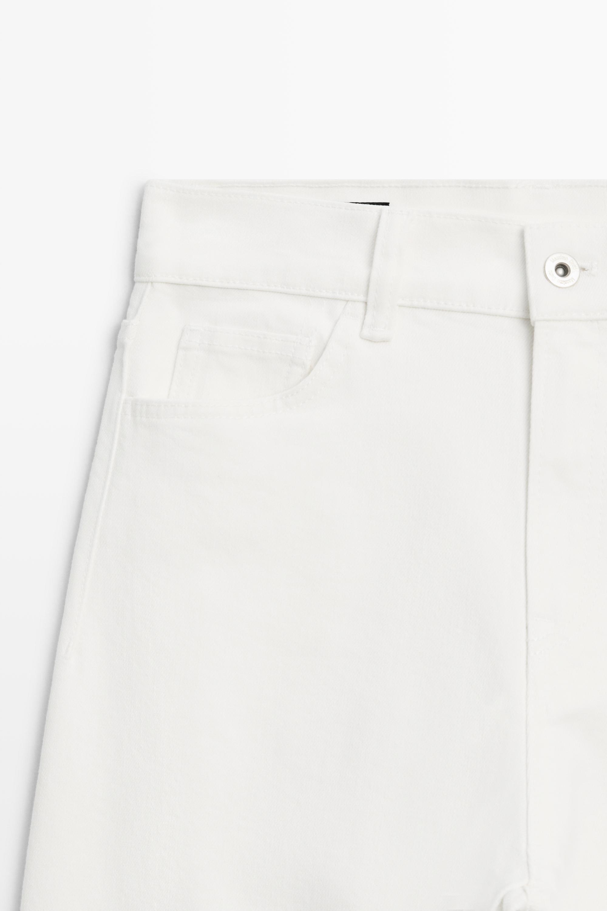 Jean capri taille moyenne retroussé